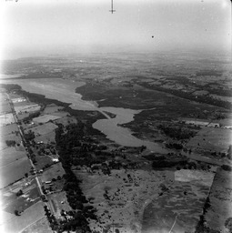 Looking down Highway 15 and entrance to Kingston Mills. - V25.6-1-9-40